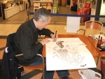 Il Maestro Beccari alle prese con la realizzazione di una sua opera davanti agli occhi dei clienti del Centro Commerciale
